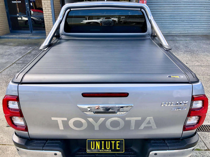 Back view of Toyota Hilux SR5 with UniUte EGen2 Electric Roller Shutter for 2015-2025 models, hilux roller shutter installed.