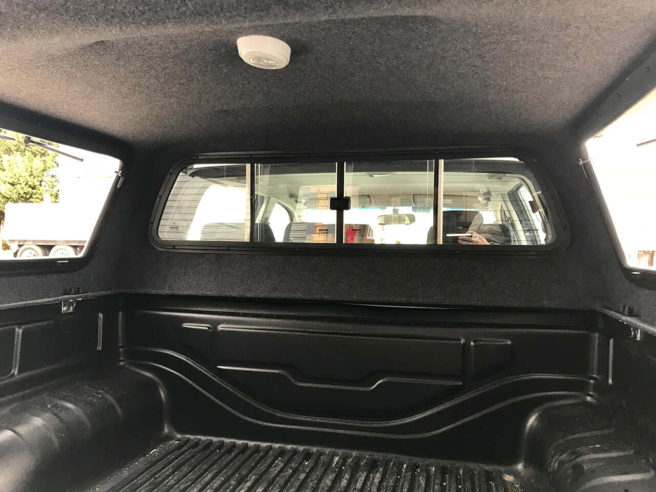 Interior view of UniUte ELEGANCE canopy for Toyota Hilux SR Workmate 2005-2014, enhancing functionality and style.