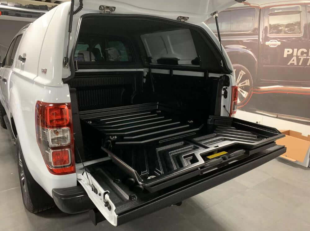 Toyota Hilux 2004-2025 with UniUte Sliding Tray Drawer installed for ultimate versatility and strength, featuring easy access ute slide tray.