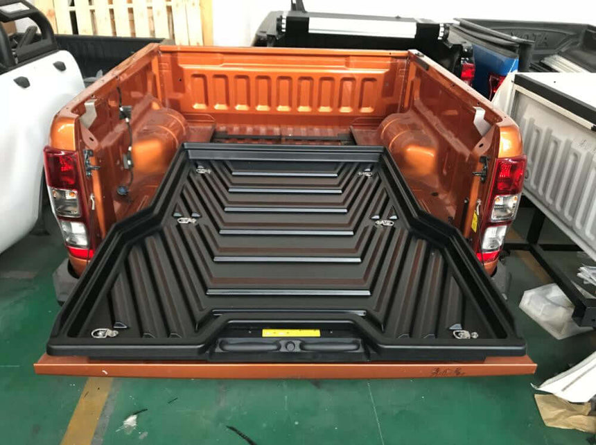 Ute slide tray installed on Toyota Hilux 2004-2025 for enhanced utility and storage.