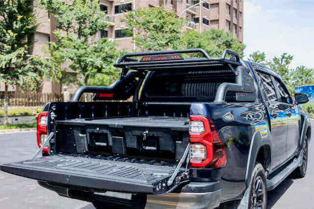 Hilux drawers installed on 2015-2025 Toyota with UniUte Weathertight Ute Drawer System, perfect for adventure and storage.