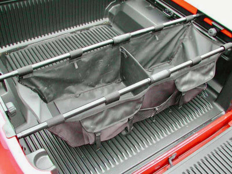 Universal ute tub organiser hammock in a truck bed for secure storage