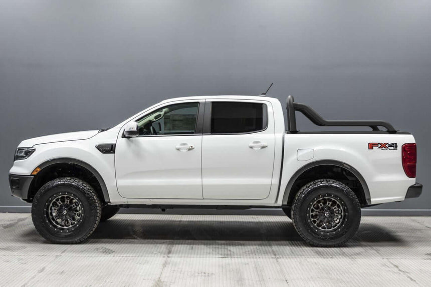 White truck with extended sports bar and matte black finish, designed for Gen2 and EGen2 roller shutters, parked in a studio setting.