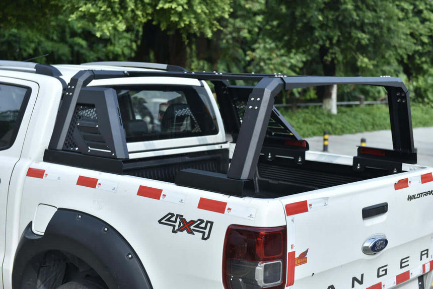 Heavy-duty ute tub rack with multifunction ladder rack installed on a white truck, ideal for carrying tools and outdoor gear.