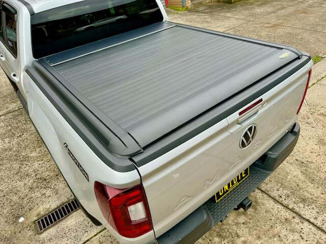 Amarok roller cover electric black lid shutter on Volkswagen 2023+ for security and style.