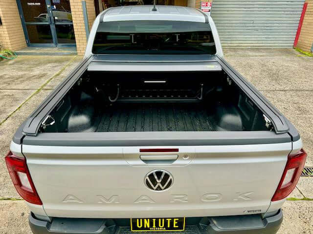 Amarok roller cover on Volkswagen 2023 with UniUte EGen2 electric shutter, enhancing style and security.