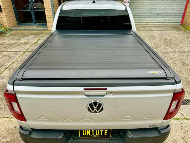 Volkswagen Amarok 2023 with UniUte EGen2 Electric Black amarok roller cover for enhanced security and style.