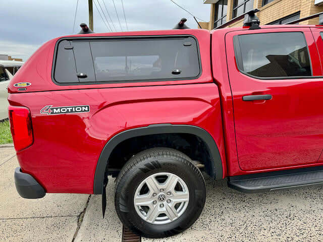 Red Volkswagen Amarok canopy for 2023+ models, side view showcasing amarok canopy design by UniUte