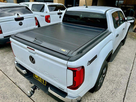 Volkswagen Amarok 2023 truck with amarok roller shutter manual cover parked outdoors