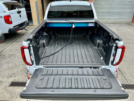 Volkswagen Amarok 2023+ Gen2 with open amarok roller shutter showcasing spacious ute bed.