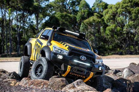 Toyota Hilux Tonka concept truck navigating rocky terrain