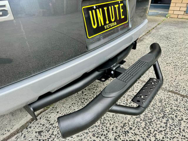Rear Towbar Step attached to a vehicle, enhancing utility and safety for easy access.