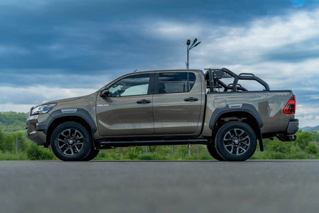 Toyota Accessories on display with a Toyota truck outdoors.
