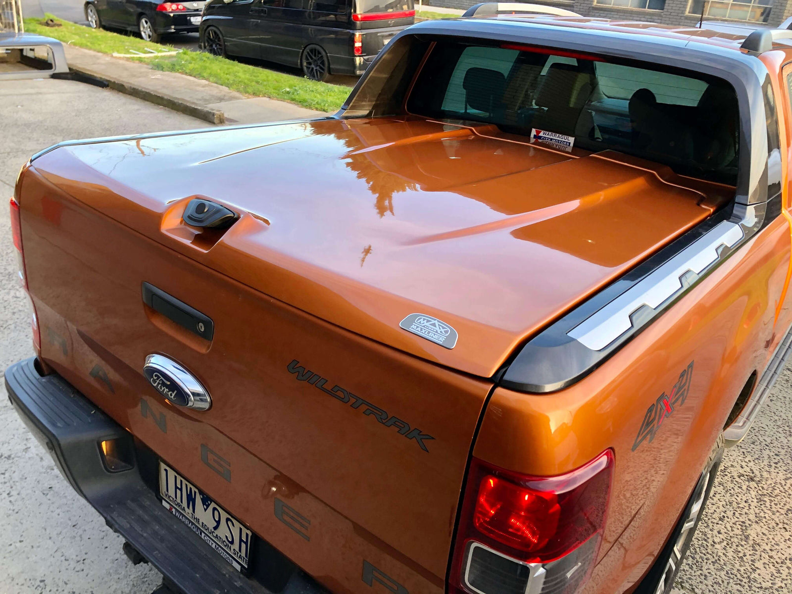 Ute Hard Lids Brisbane on a brown pickup truck in a parking area