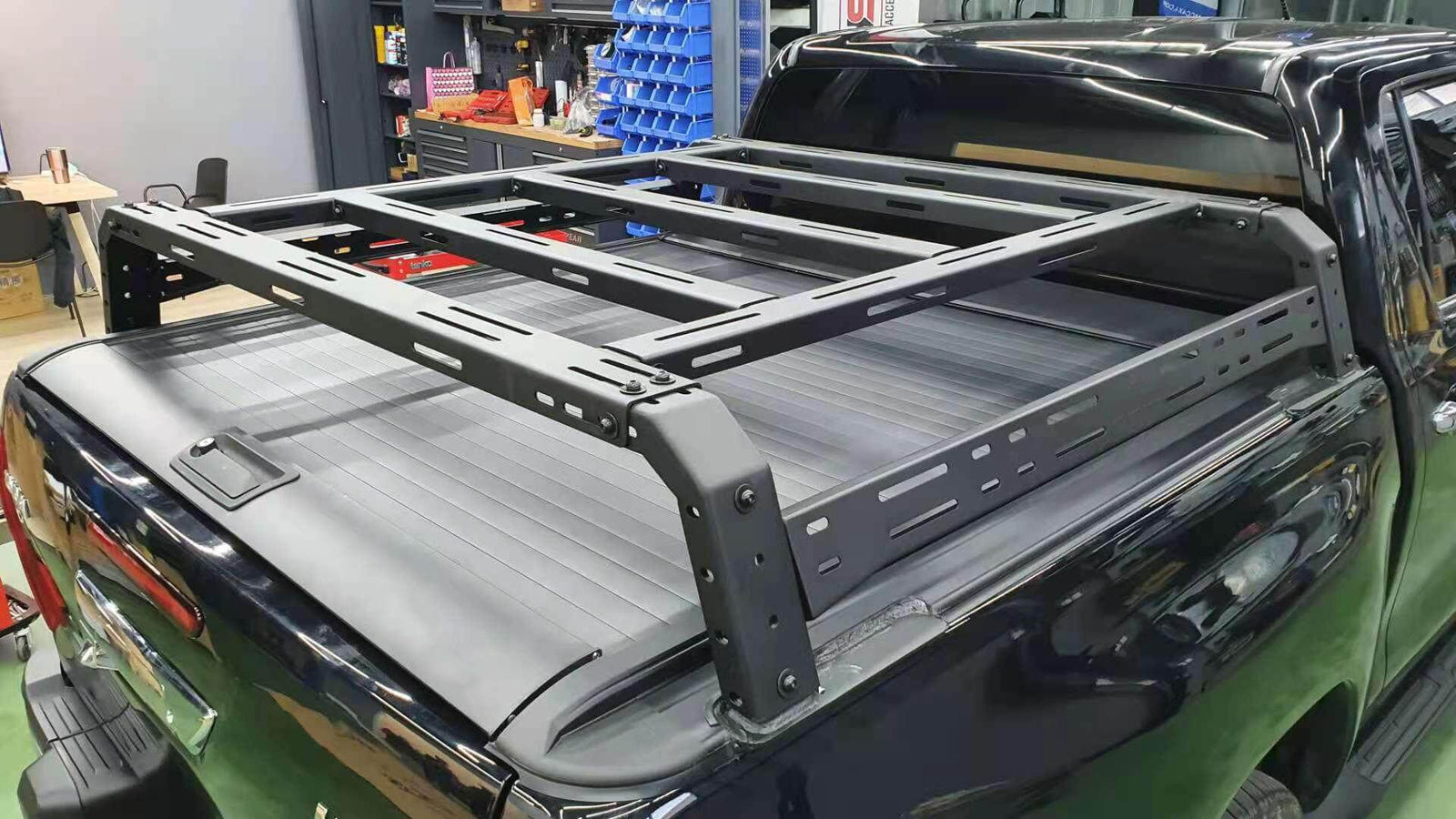 Black Hilux Tub Rack installed on a pickup truck bed