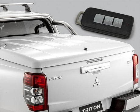 Remote Control Central Lock Kit featured with key fob for enhanced car security, shown with truck back view.