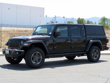 Jeep Gladiator parked outdoors showcasing its rugged design and advanced features