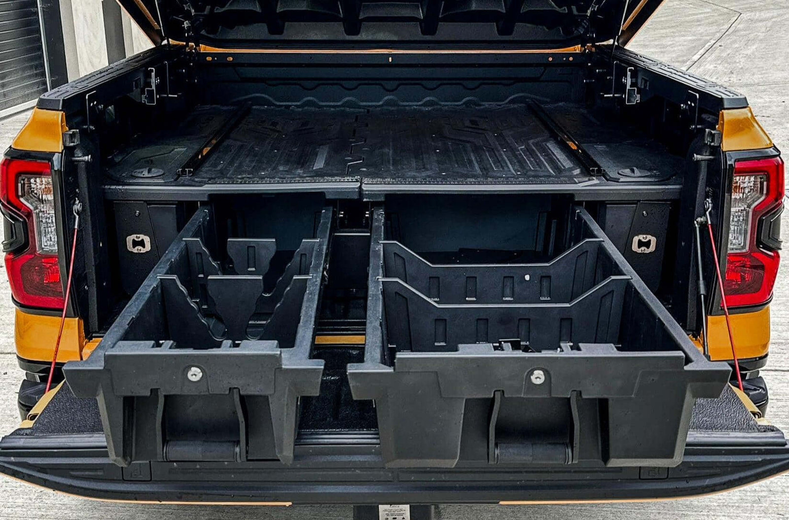 Truck with open Four Wheel Drive Drawers for efficient off-road storage, showcasing organized compartments and rugged design.