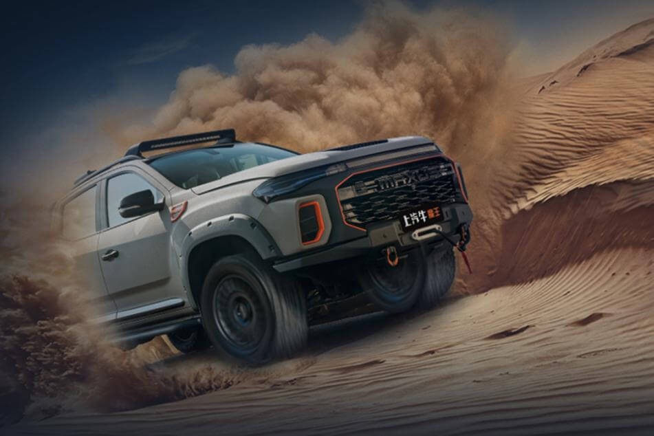 LDV Ute Accessories: Customized LDV ute in action on sandy terrain for off-road adventure.