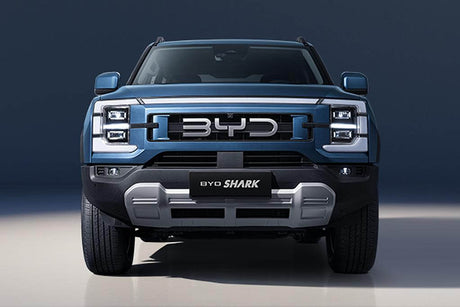 Front view of the BYD Shark Ute showcasing its sleek design in a studio setting.