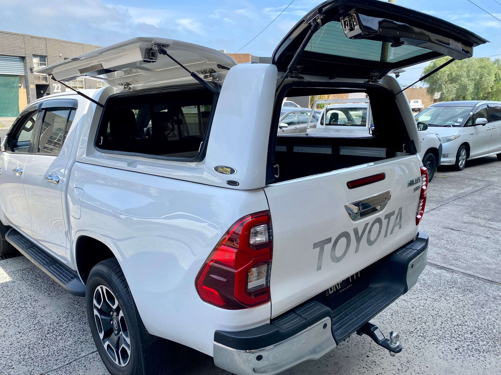 Toyota ute with open Melbourne canopies showcasing storage and adventure capabilities.