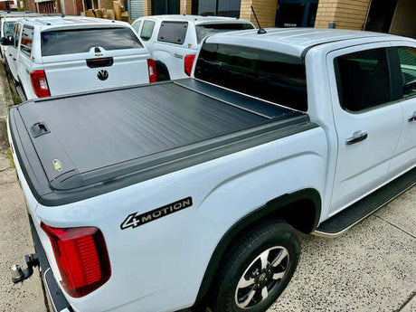 Manual ute roller shutter fitted to a dual-cab tub