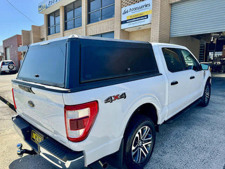 White Ford F-150 accessories showcased, emphasizing durability and versatility of Ford F150 accessories.