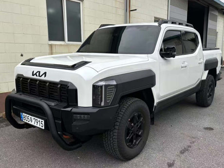 Black 4x4 vehicle with UniUte NUDGE BARS for enhanced style and protection