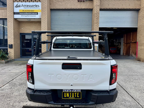 Heavy duty ladder rack for roller shutters — rear view showing rack width on ute
