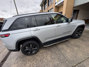 UniUte running boards on Jeep Grand Cherokee WL L 2022–2025 — rear step detail and finish