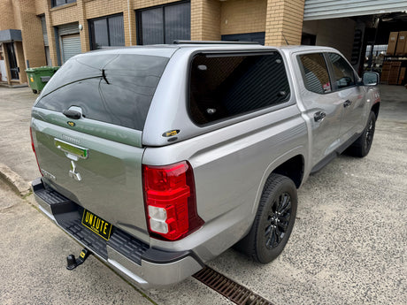 Fibreglass canopy for Mitsubishi Triton MV 2024+ — installed on ute showing full profile | UniUte