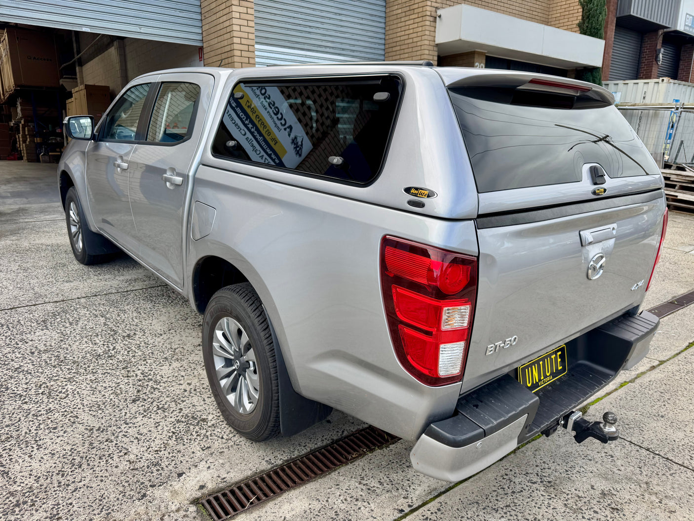 Mazda BT-50 canopy — side window open showing ventilation and access