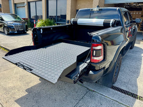 Sliding tray for RAM 1500 5.7 bed — fully extended showing complete access | UniUte