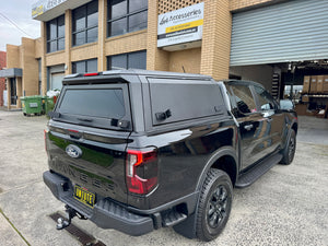 Ranger NextGen stainless steel canopy — rear three-quarter view showing the door and finish