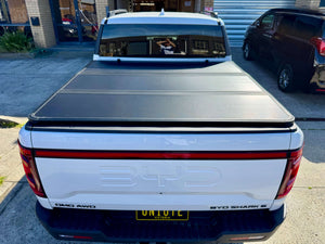 BYD Shark 6 hard lid tri-fold cover on 2025 model, providing style and security for your ute.