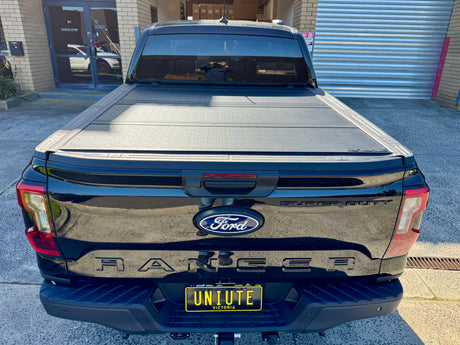 Ford Ranger NextGen 2022+ quad-fold lid — front panel lifted showing tub access