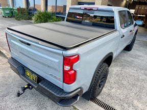 Tri-fold hard lid for Chevrolet Silverado 1500 2014-2026 — installed closed | UniUte