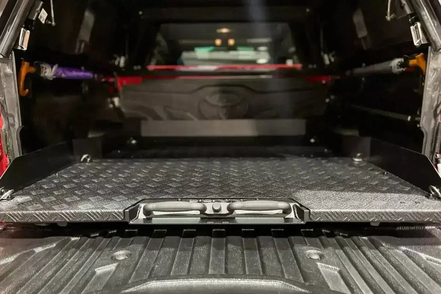 Cargo tray for Jeep Gladiator 2020-2025, featuring UniUte sliding tray drawer for enhanced vehicle storage solutions.