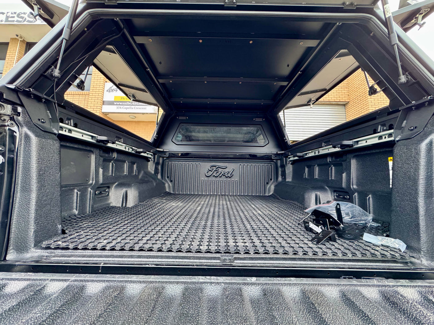 Ranger NextGen stainless steel canopy — weather seals and mounting detail along the tub rail