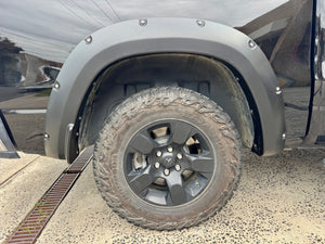 RAM 1500 DT fender flares — side view showing all four arches fitted