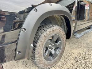 UniUte fender flares for RAM 1500 DT — front wheel arch installed close-up