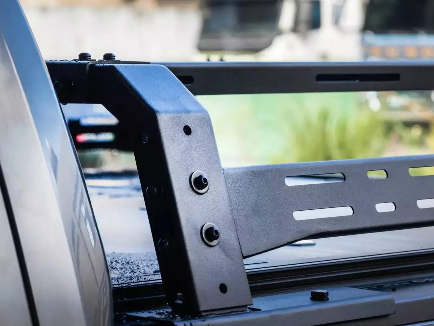 Close-up view of tub rack universal multifunction utility rack carrier cage on a vehicle, showcasing its durable and rugged design.