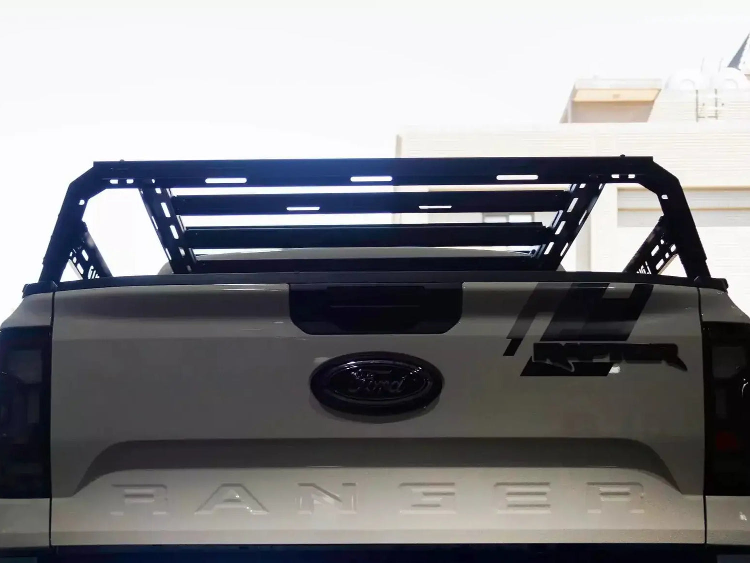 Back view of a ute equipped with a tub rack universal multifunction utility rack carrier cage for secure gear transport.