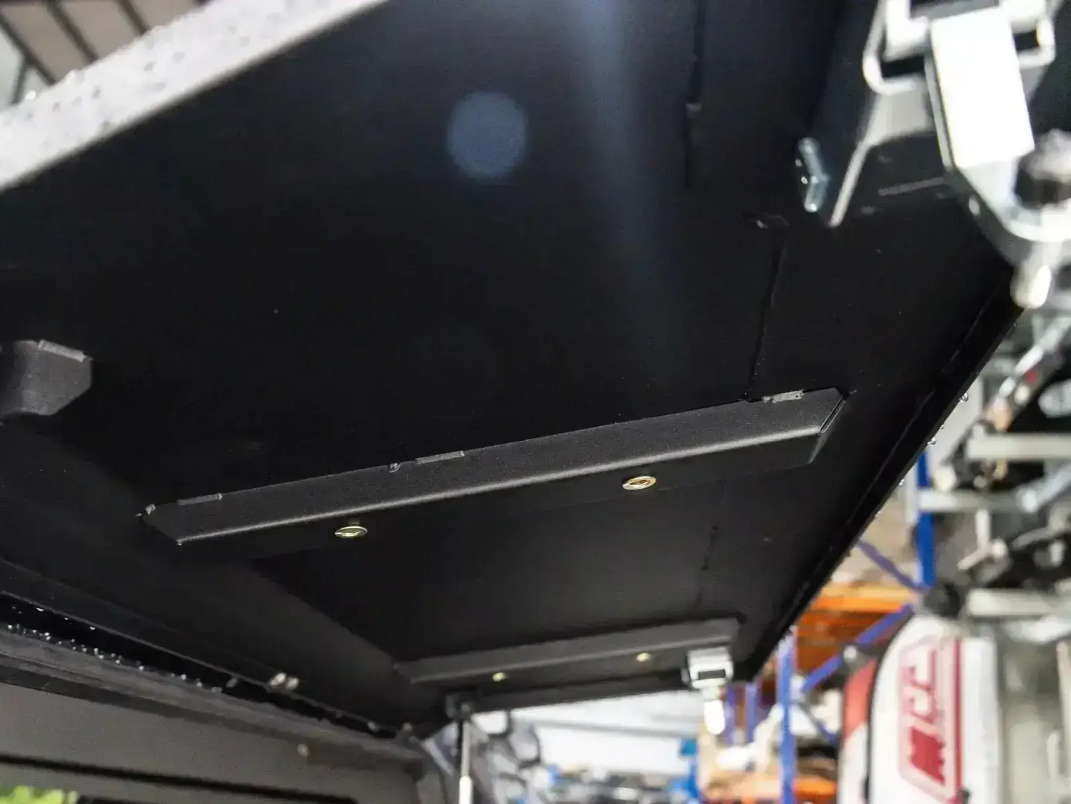 Underside view of KGM Musso Canopy, stainless steel ute accessory for SsangYong Musso XLV 2018-2025, highlighting durability.