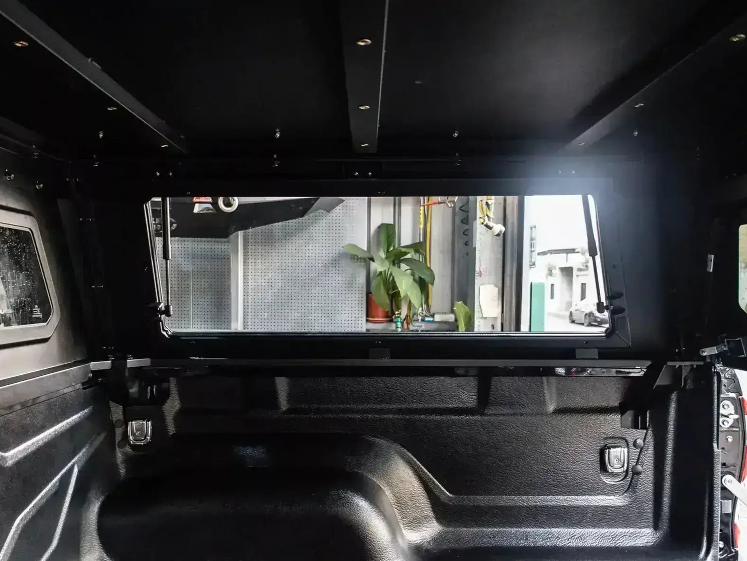 Interior view of KGM Musso Canopy XLV 2018-2025 stainless steel ute canopy showcasing durability and design for tough conditions.