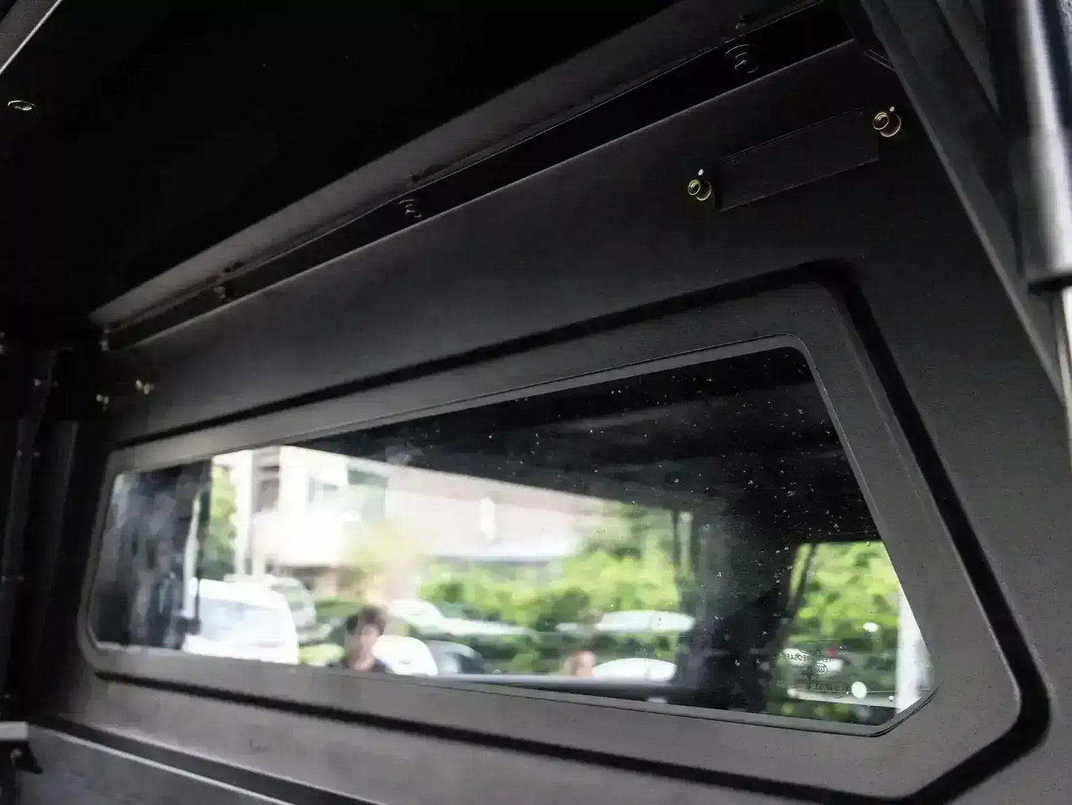 Interior view of KGM Musso canopy demonstrating stainless steel design for KGM SsangYong Musso XLV 2018-2025. Durable ute accessory.