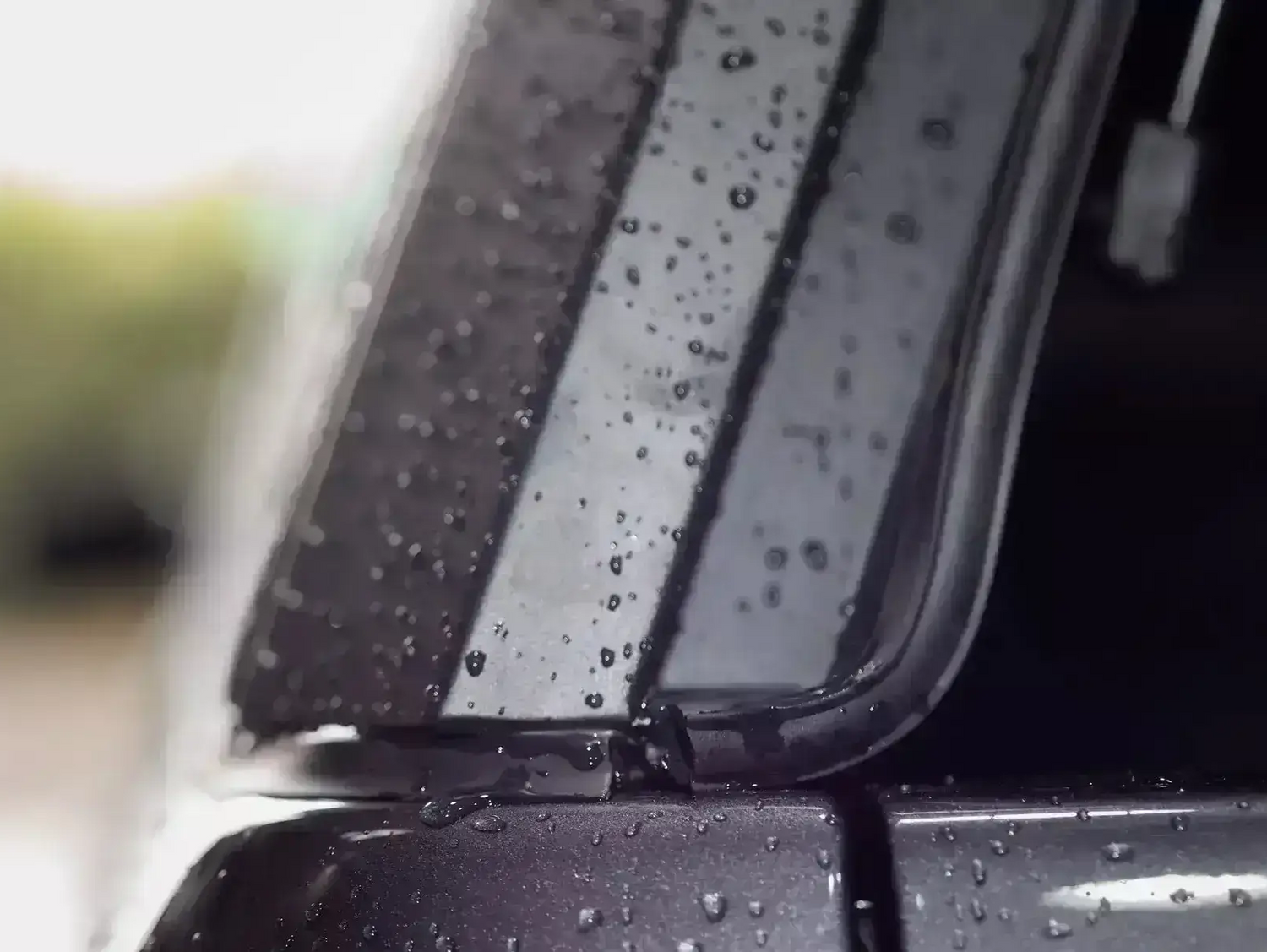 Close-up of KGM Musso Canopy on SsangYong Musso XLV showing stainless steel durability in rainy weather