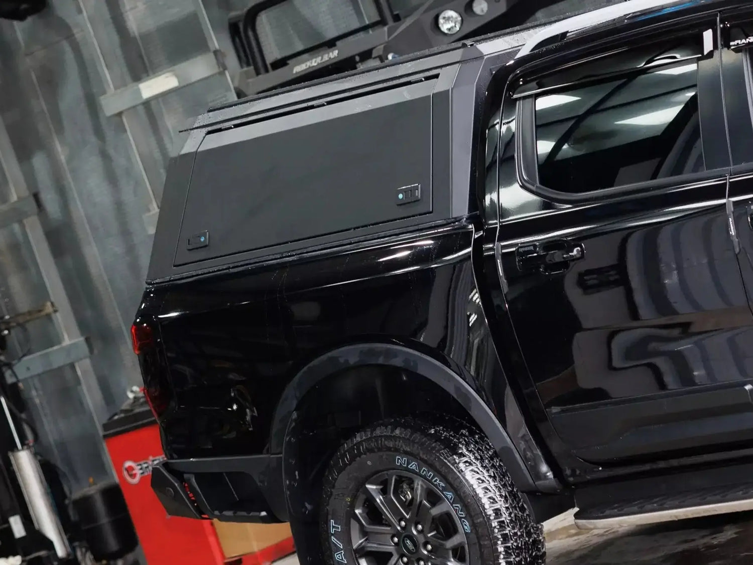 Stainless steel canopy ford ranger NextGen 2023 in a garage, highlighting durability and style for 4x4 ute accessories.