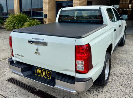 Triton MV 2024+ soft tri-fold cover — closed position on truck bed