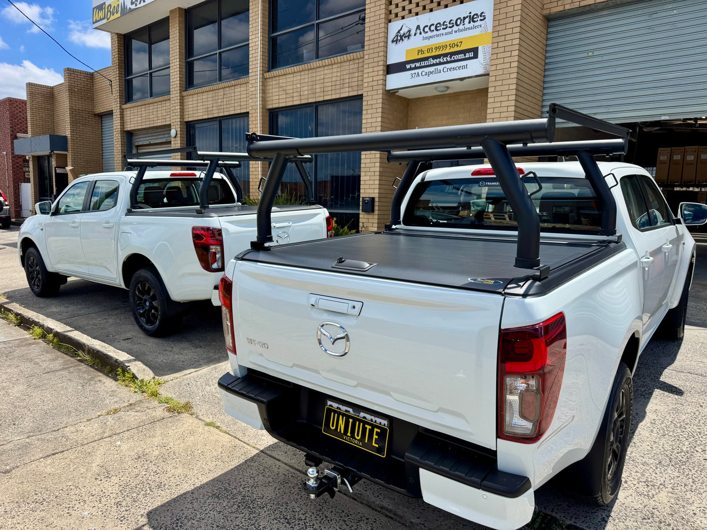 Roller shutter ladder rack system — pair of bars fitted showing spacing